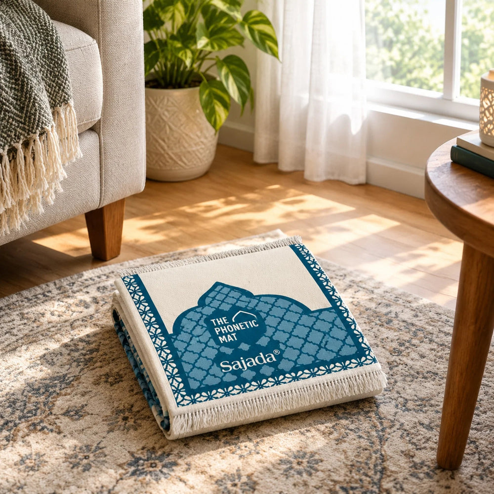 Folded phonetic prayer mat resting in a quiet home prayer space