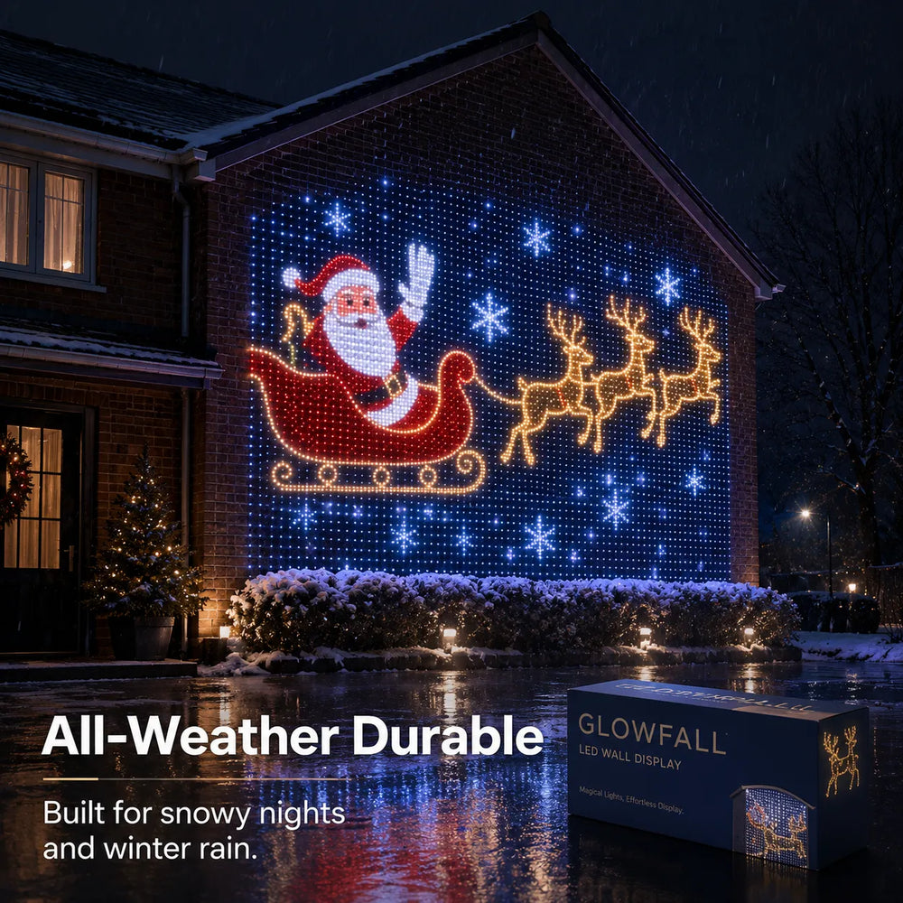 Santa and reindeer LED wall display decorating a house during Christmas